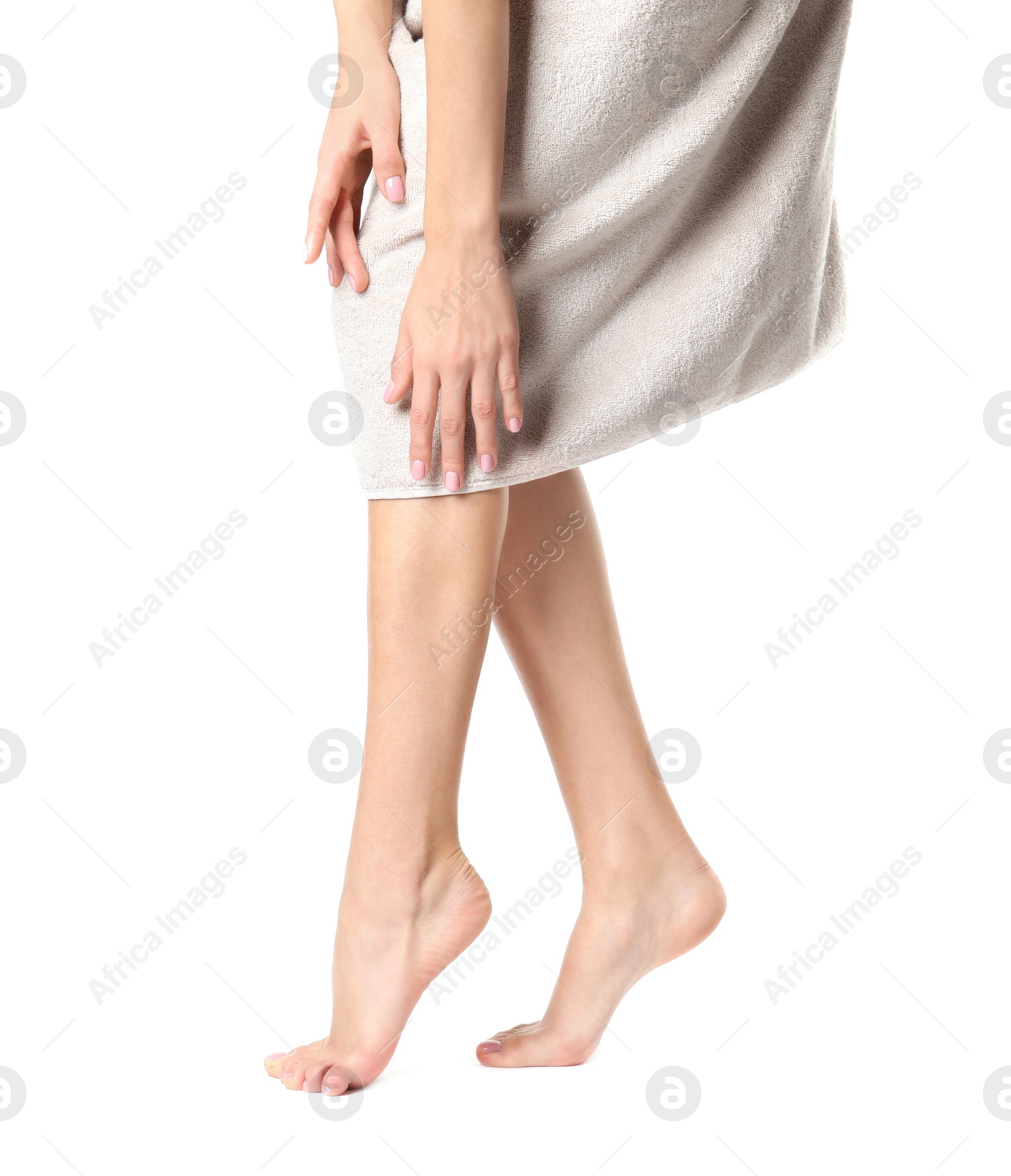 Photo of Woman with beautiful legs on white background, closeup. Spa treatment