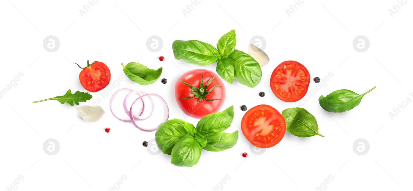 Image of Fresh ripe tomatoes with garlic, onion, basil, arugula and peppercorns on white background, top view. Banner design