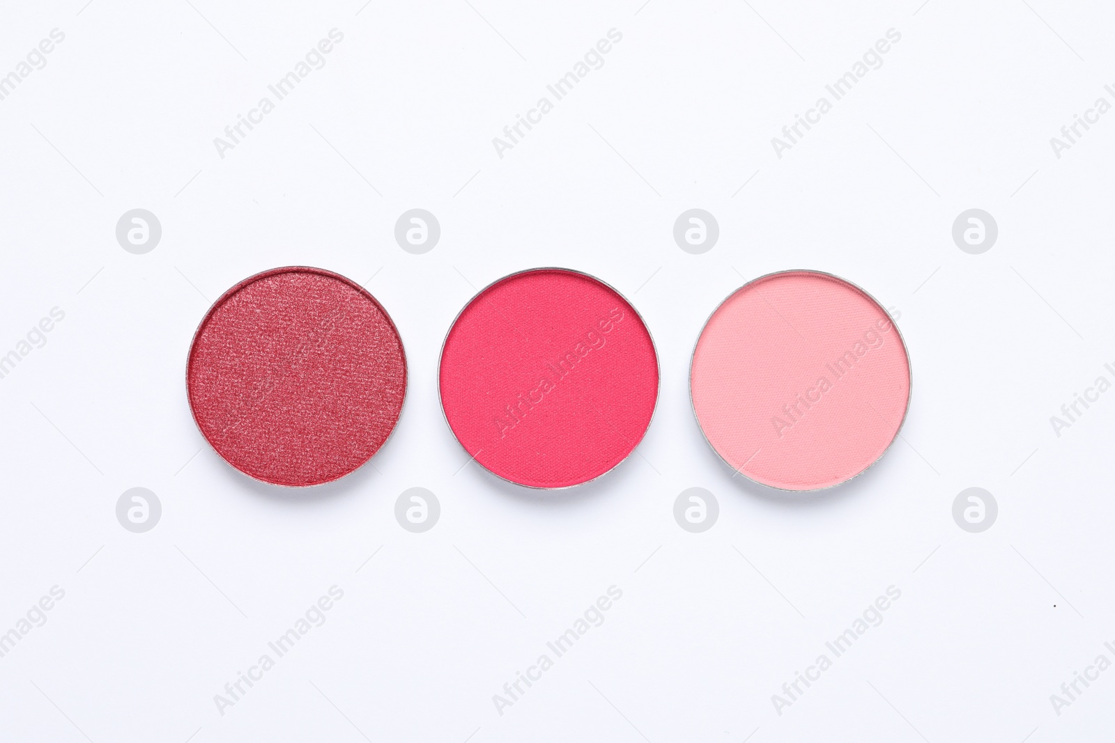 Photo of Beautiful eye shadow refill pans on white background, flat lay