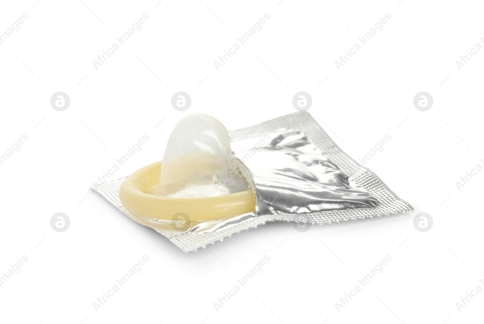 Photo of Unpacked beige condom isolated on white. Safe sex