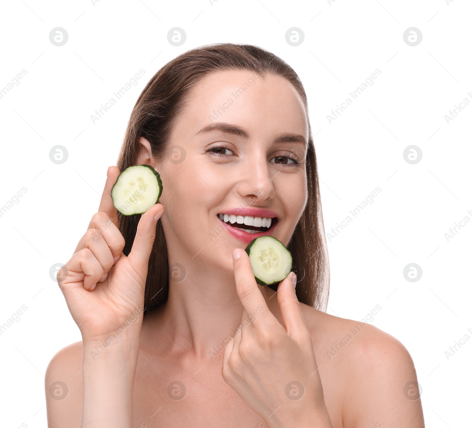 Photo of Beautiful woman with pieces of cucumber on white background