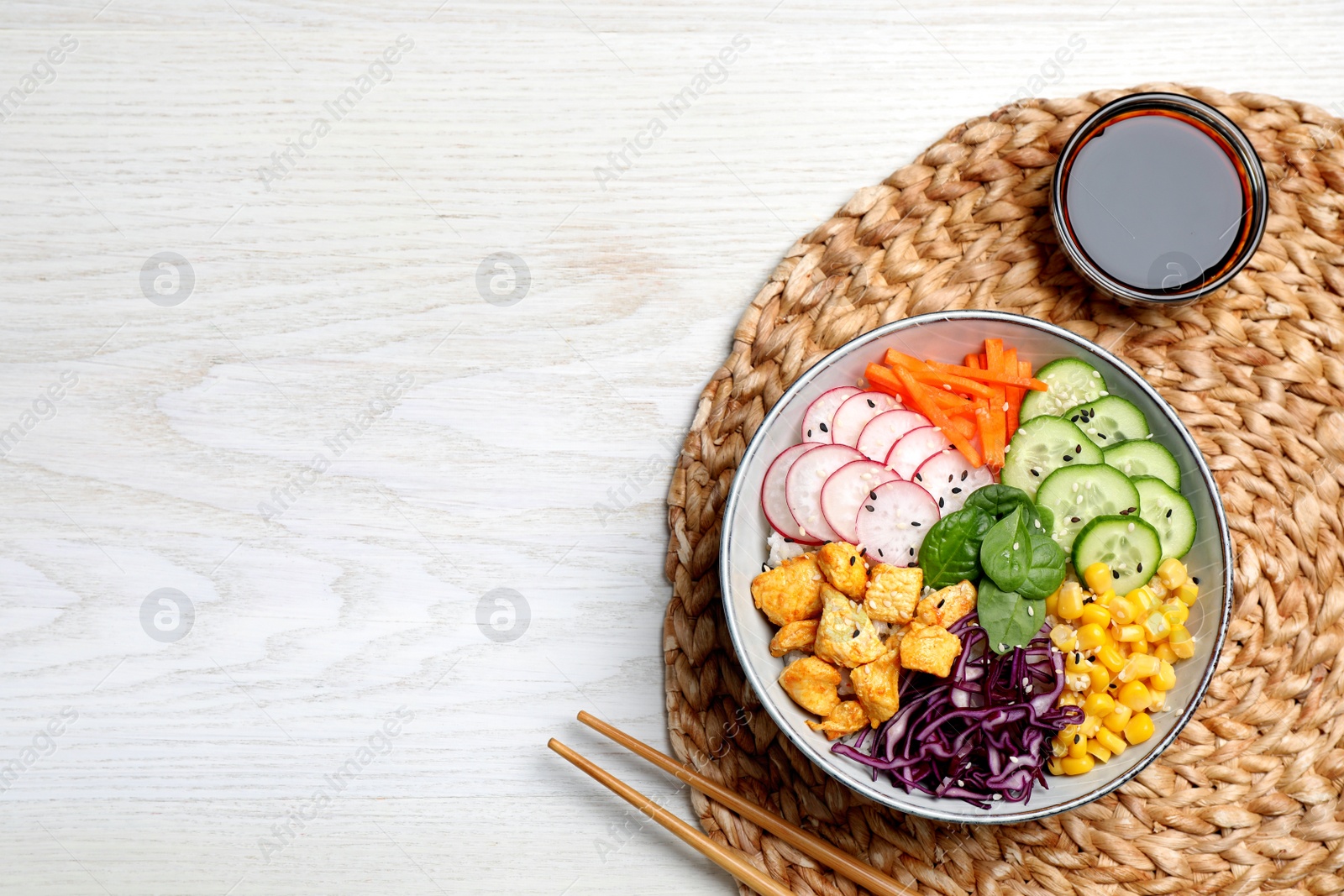 Photo of Delicious salad with chicken, vegetables and spinach on white wooden table, flat lay. Space for text