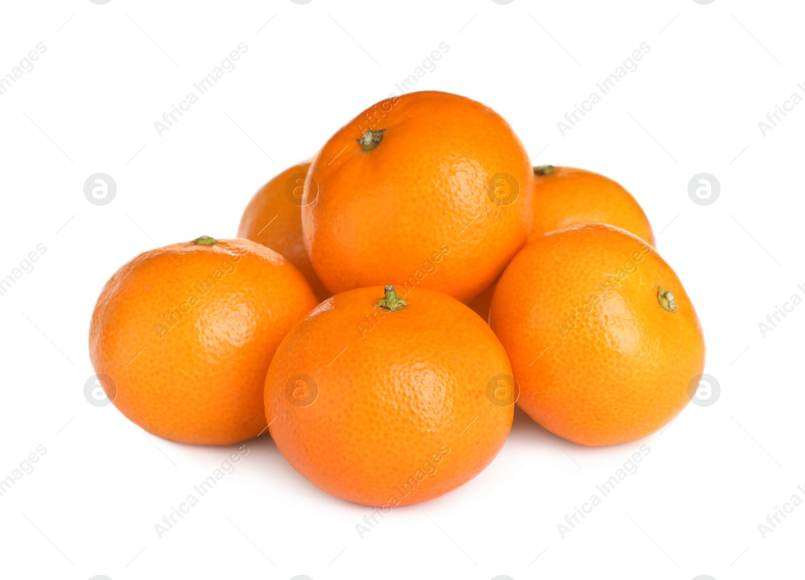 Photo of Pile of delicious ripe tangerines on white background