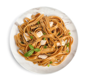 Photo of Plate of tasty buckwheat noodles with meat on white background, top view