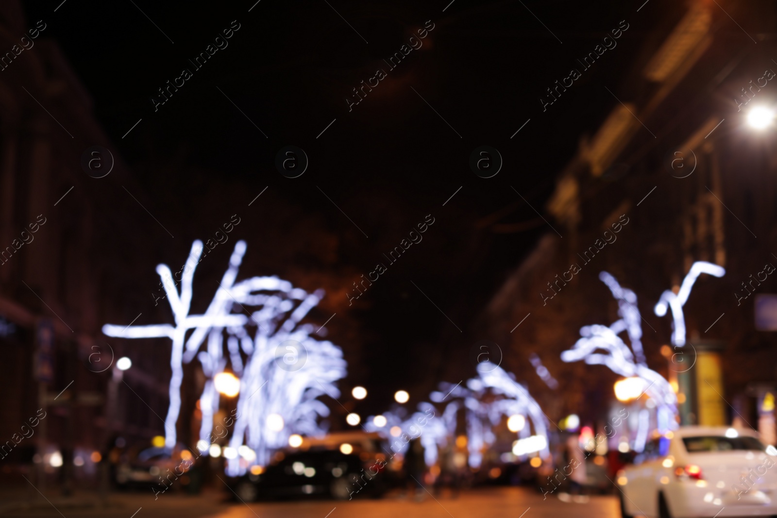 Photo of Beautiful street lights at night. Bokeh effect