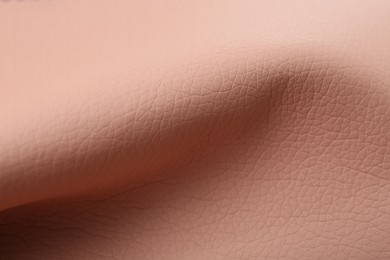 Photo of Beautiful pink leather as background, closeup view