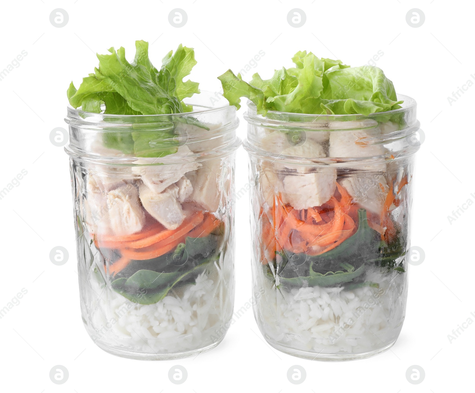 Photo of Healthy salad in glass jars isolated on white