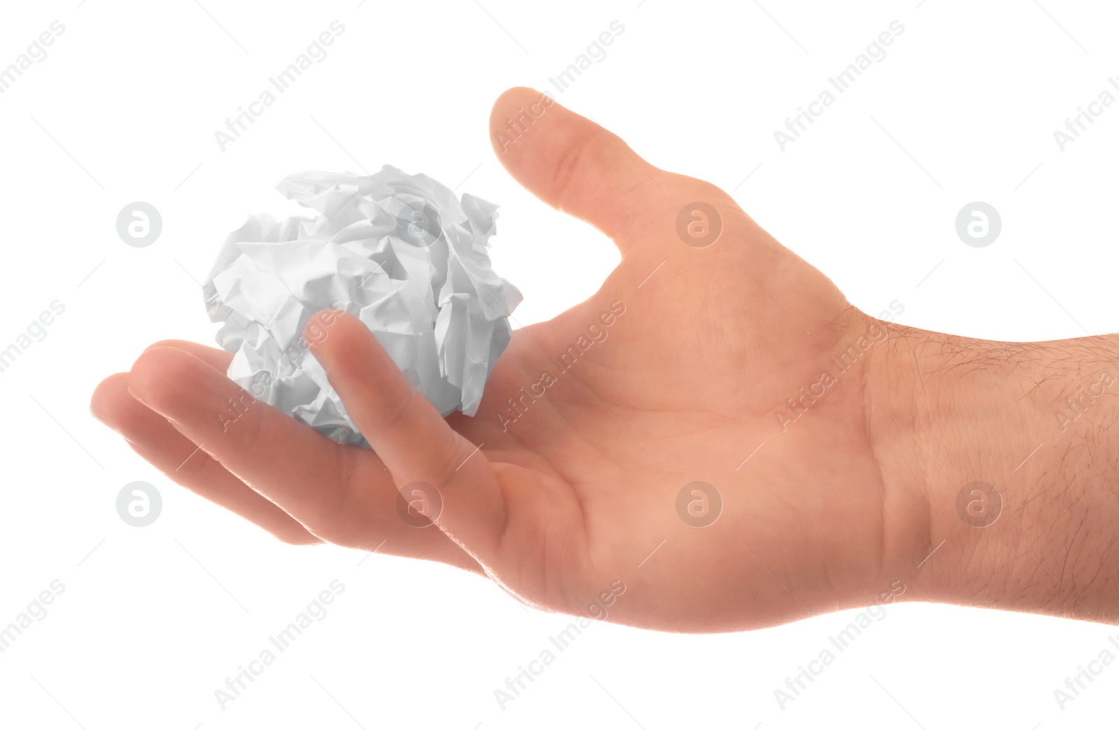 Photo of Man crumpling paper against white background, closeup. Generating idea