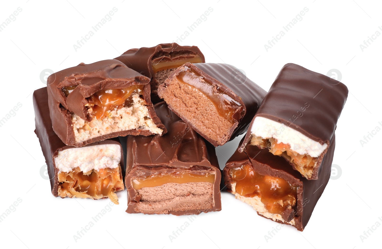 Photo of Pieces of tasty chocolate bars with nougat and nuts on white background