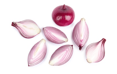 Fresh whole and cut red onions on white background, top view