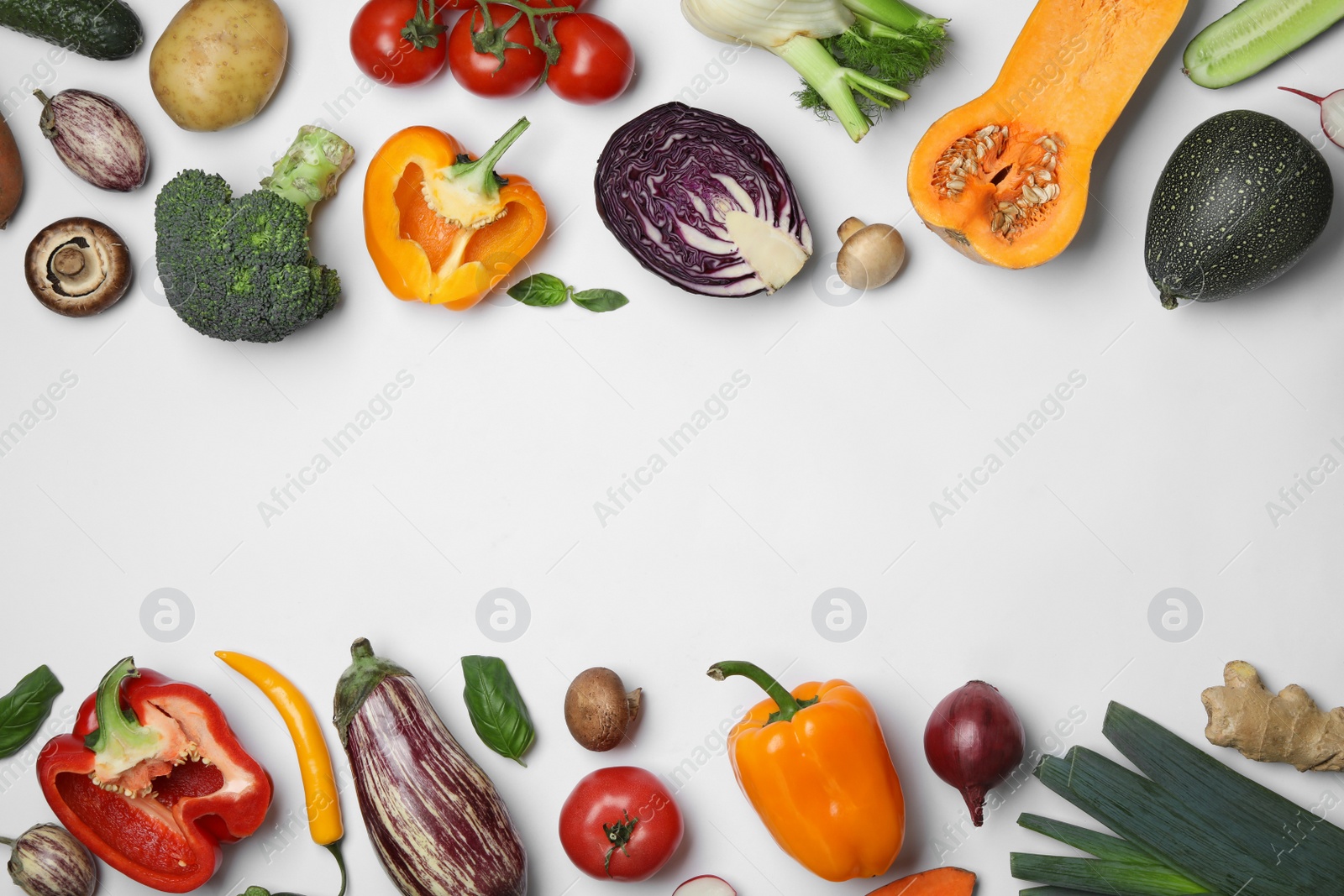 Photo of Frame made of fresh ripe vegetables on white background, flat lay. Space for text