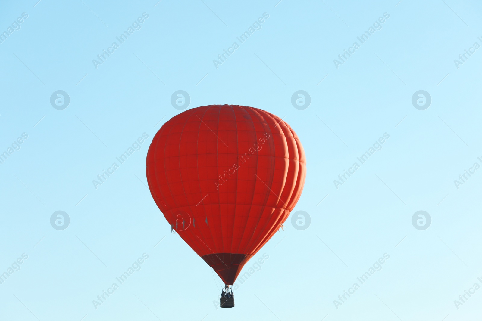 Photo of Colorful hot air balloon flying in blue sky