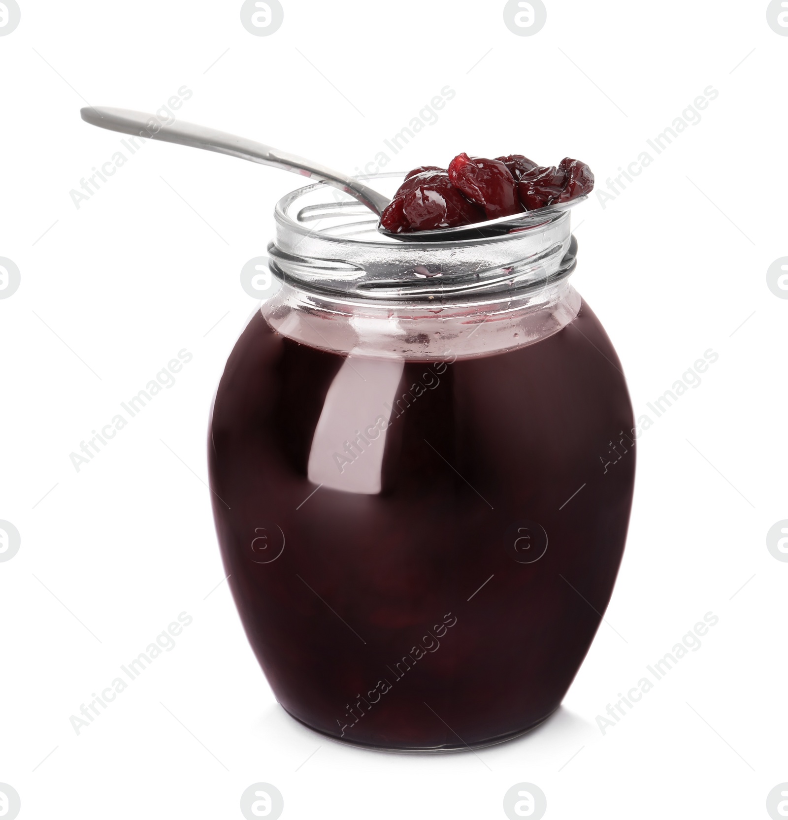 Photo of Jar and spoon of delicious pickled cherries isolated on white