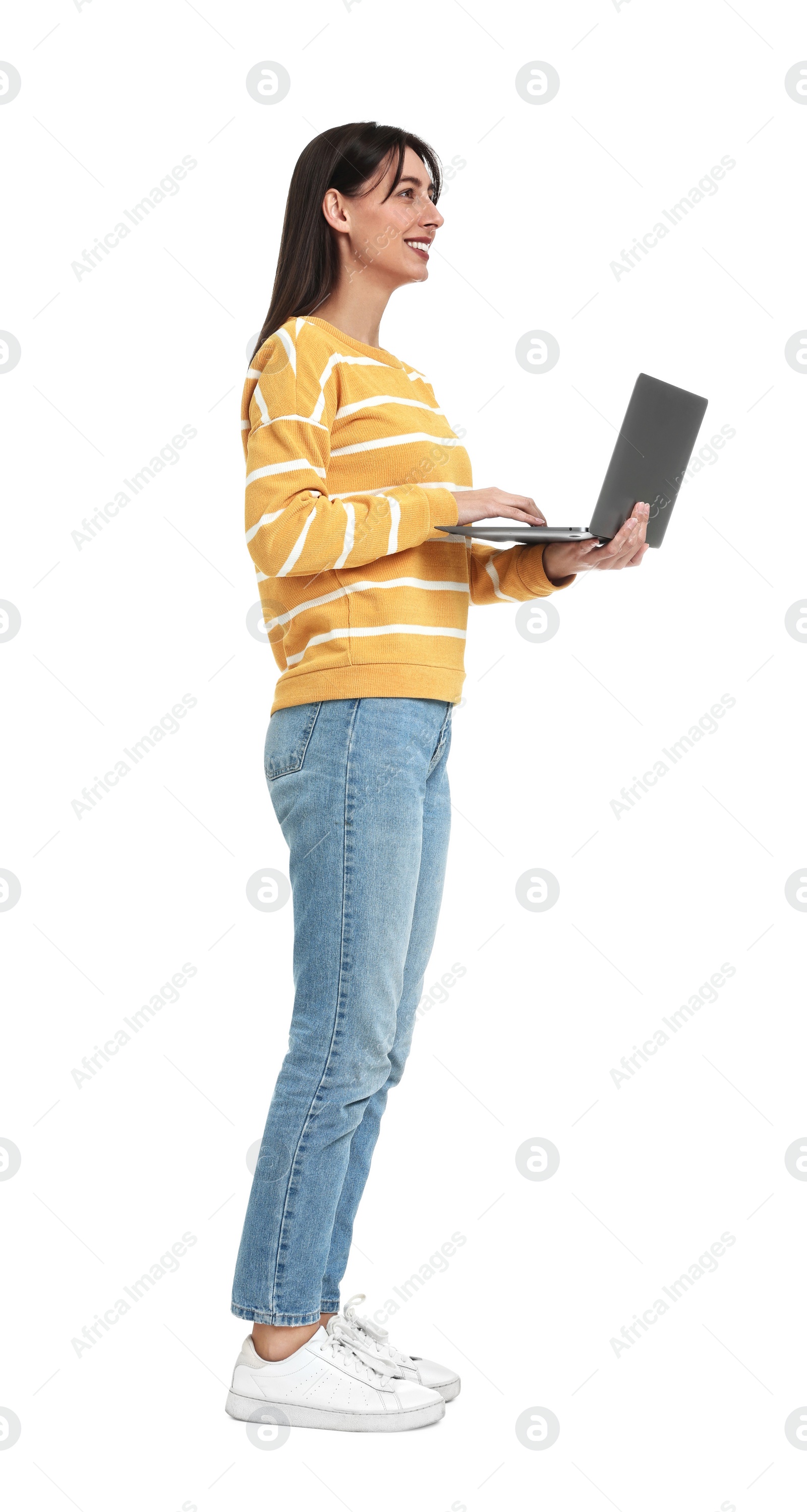 Photo of Happy woman using laptop on white background