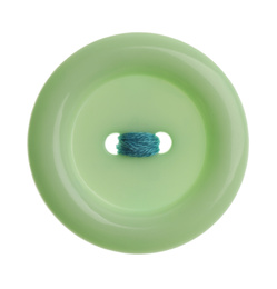 Photo of Green plastic sewing button isolated on white, top view