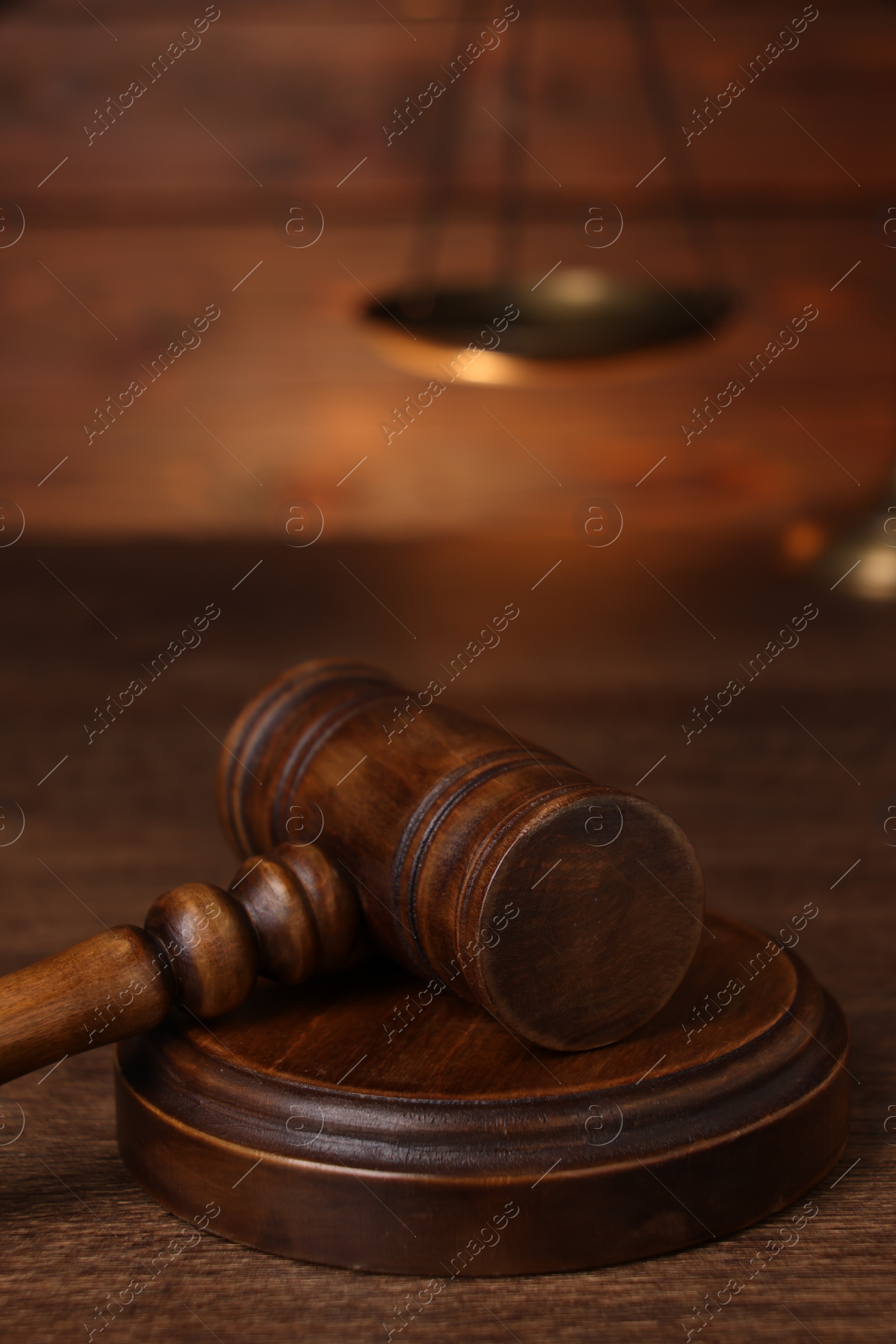Photo of Law concept. Judge's gavel on wooden table, closeup