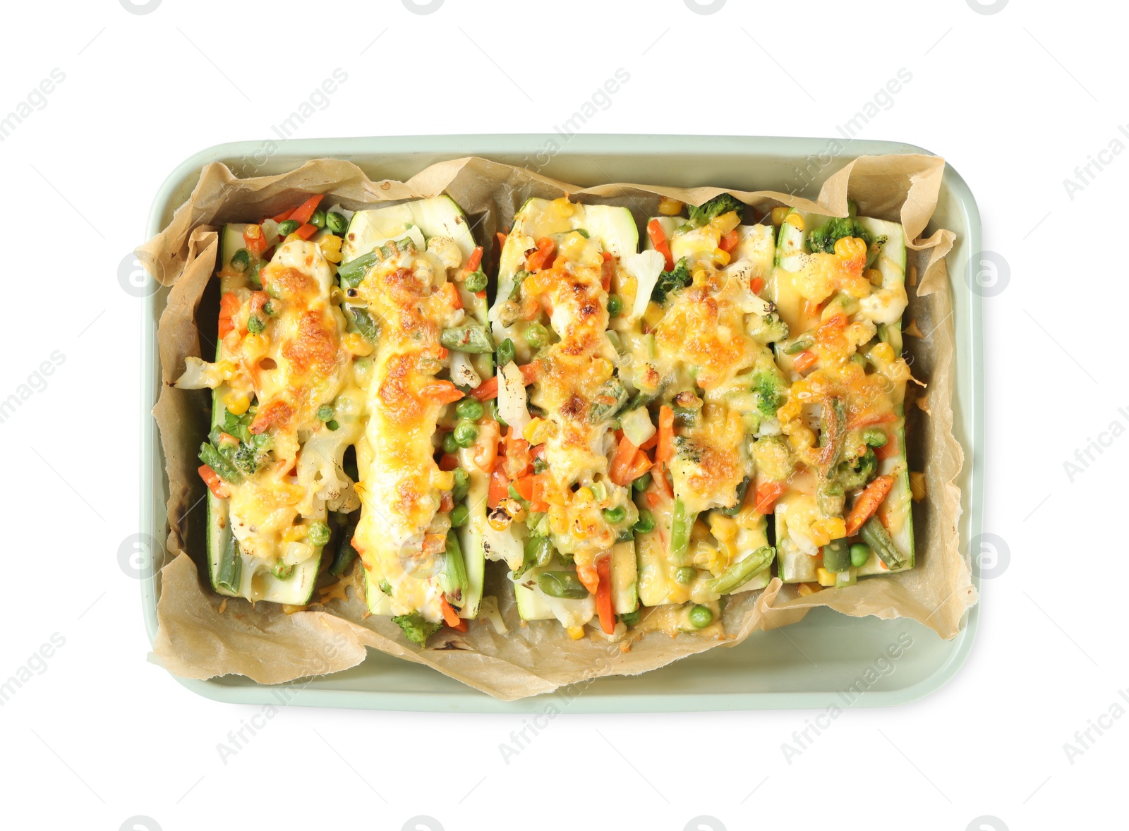 Photo of Baking dish with stuffed zucchinis on white background, top view