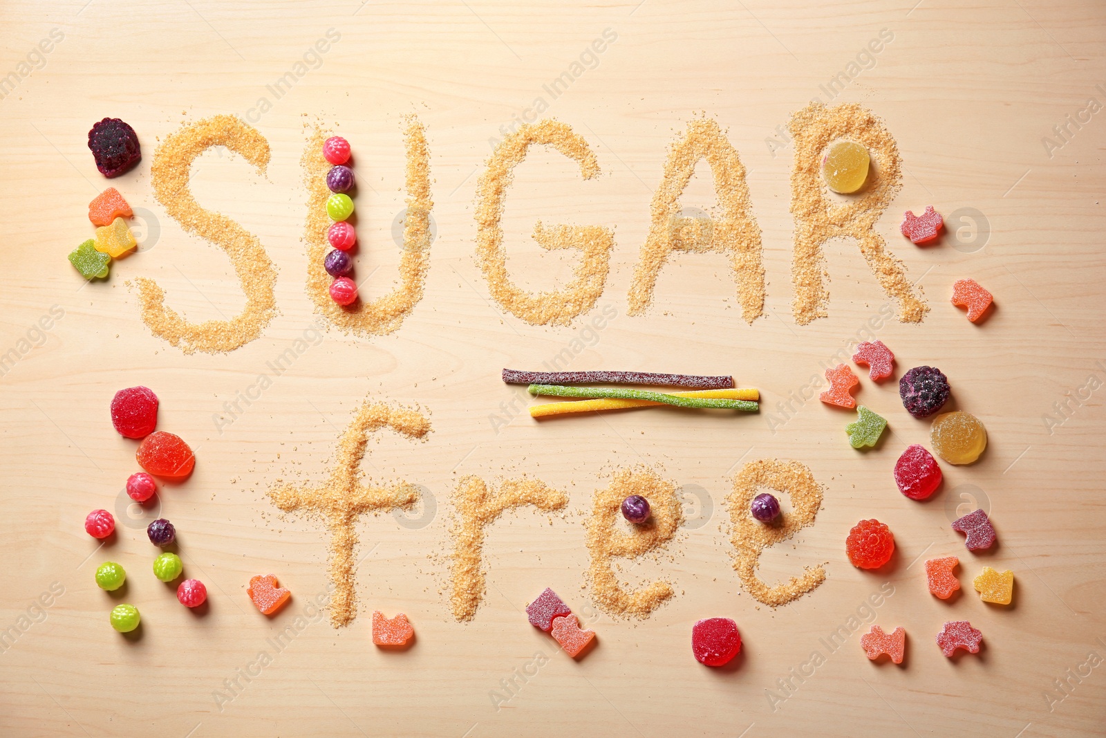 Photo of Composition with phrase SUGAR FREE on wooden background
