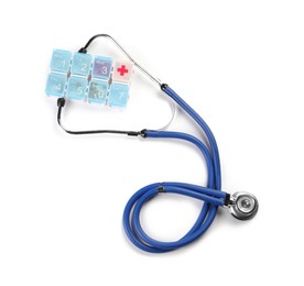 Photo of Stethoscope and plastic pill box on white background, top view