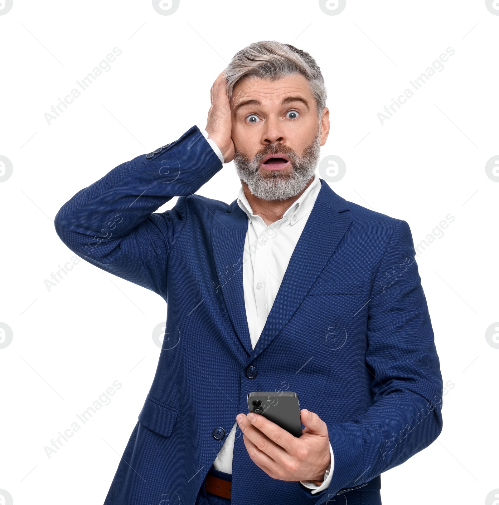 Photo of Emotional mature businessman in stylish clothes with smartphone on white background