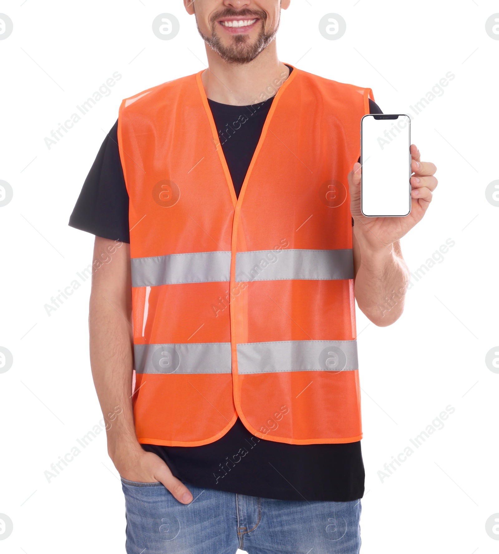 Photo of Male industrial engineer in uniform with phone on white background, closeup