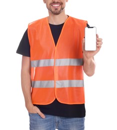 Photo of Male industrial engineer in uniform with phone on white background, closeup