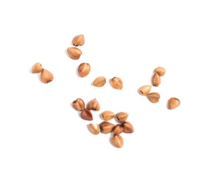 Uncooked buckwheat on white background, top view