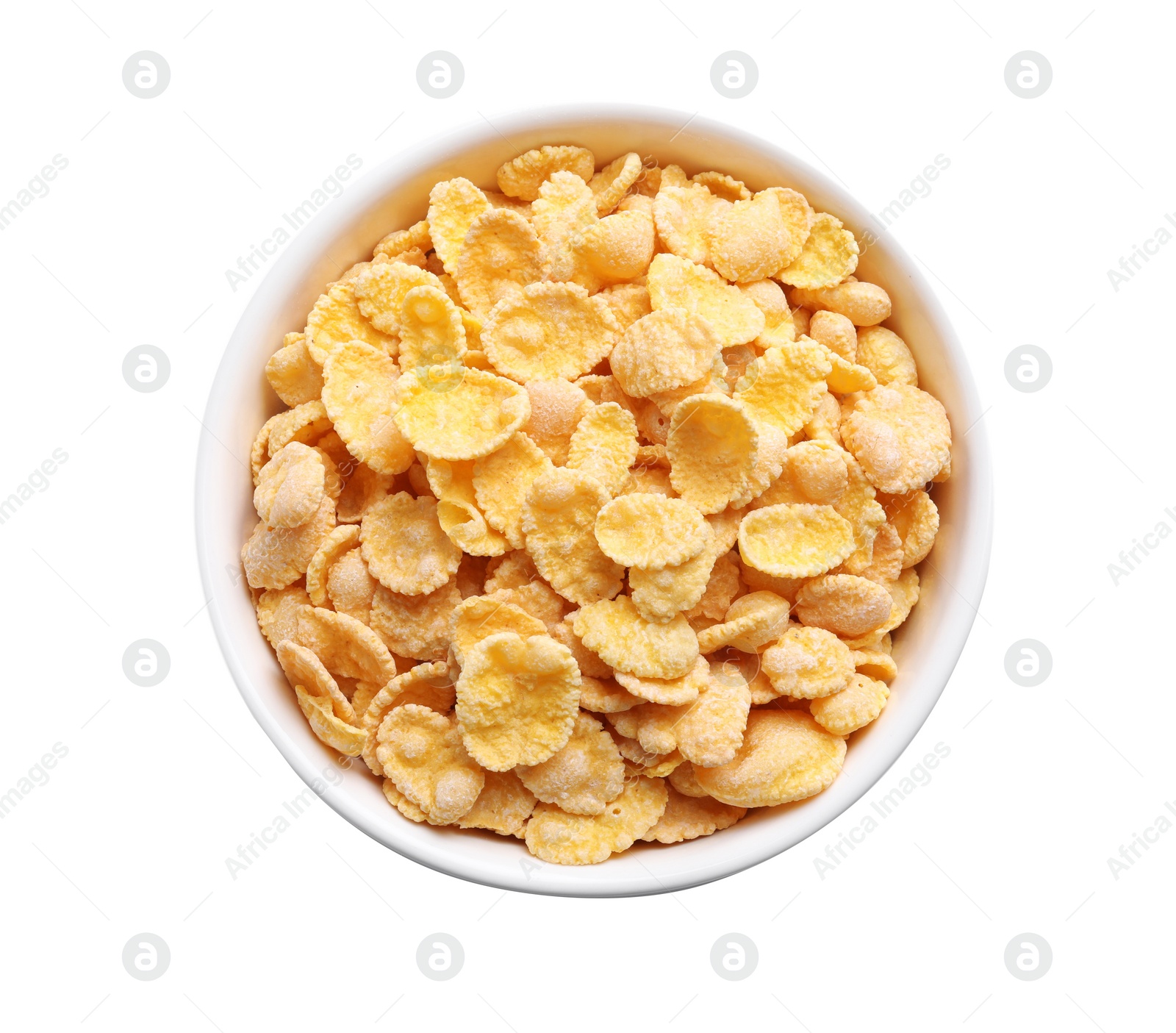 Photo of Bowl of tasty crispy corn flakes isolated on white, top view