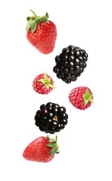 Image of Blackberries, strawberries and raspberries falling on white background