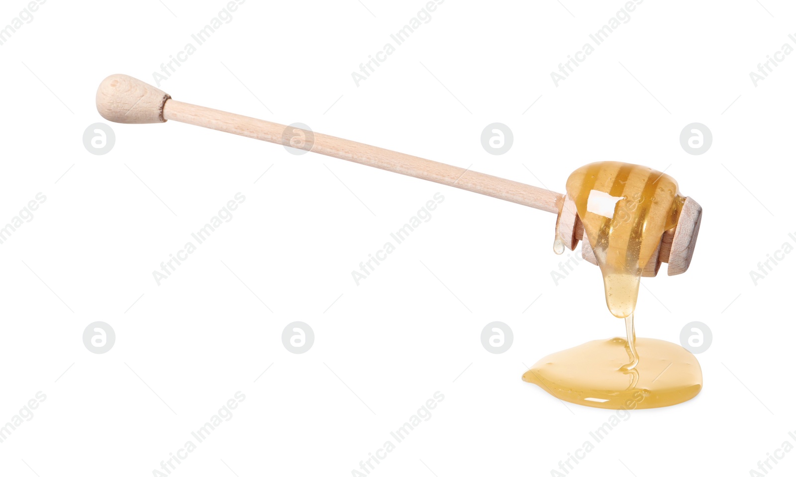 Photo of Natural honey dripping from dipper on white background