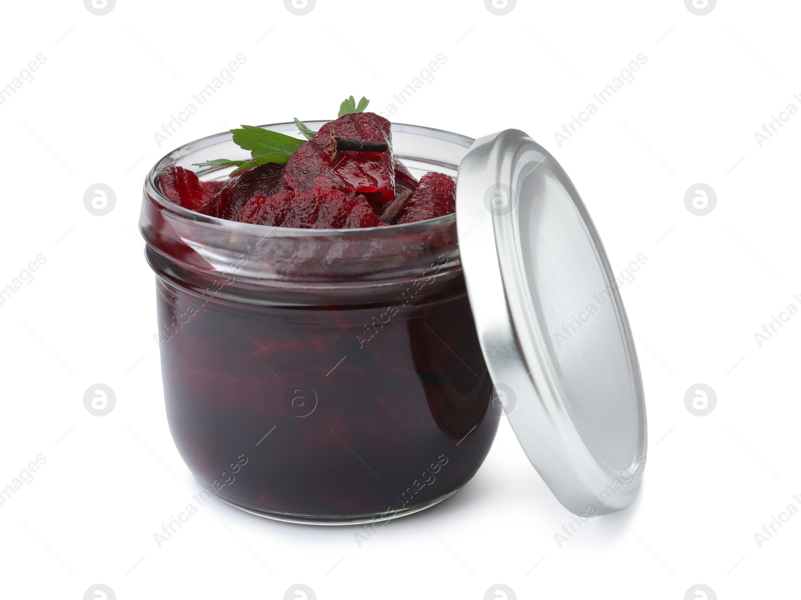 Photo of Pickled beets in jar isolated on white