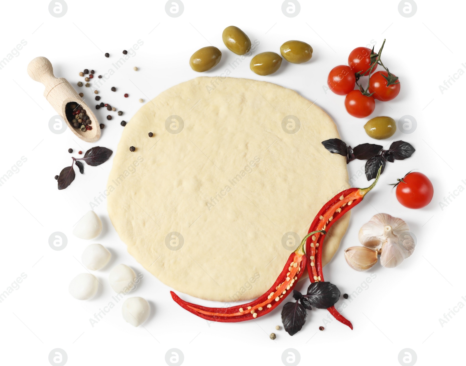 Photo of Fresh pizza dough and products isolated on white, top view