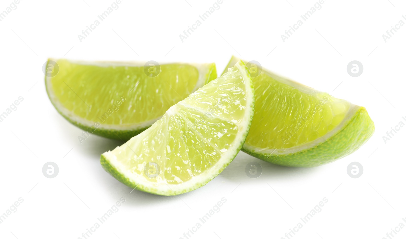 Photo of Slices of fresh ripe lime on white background