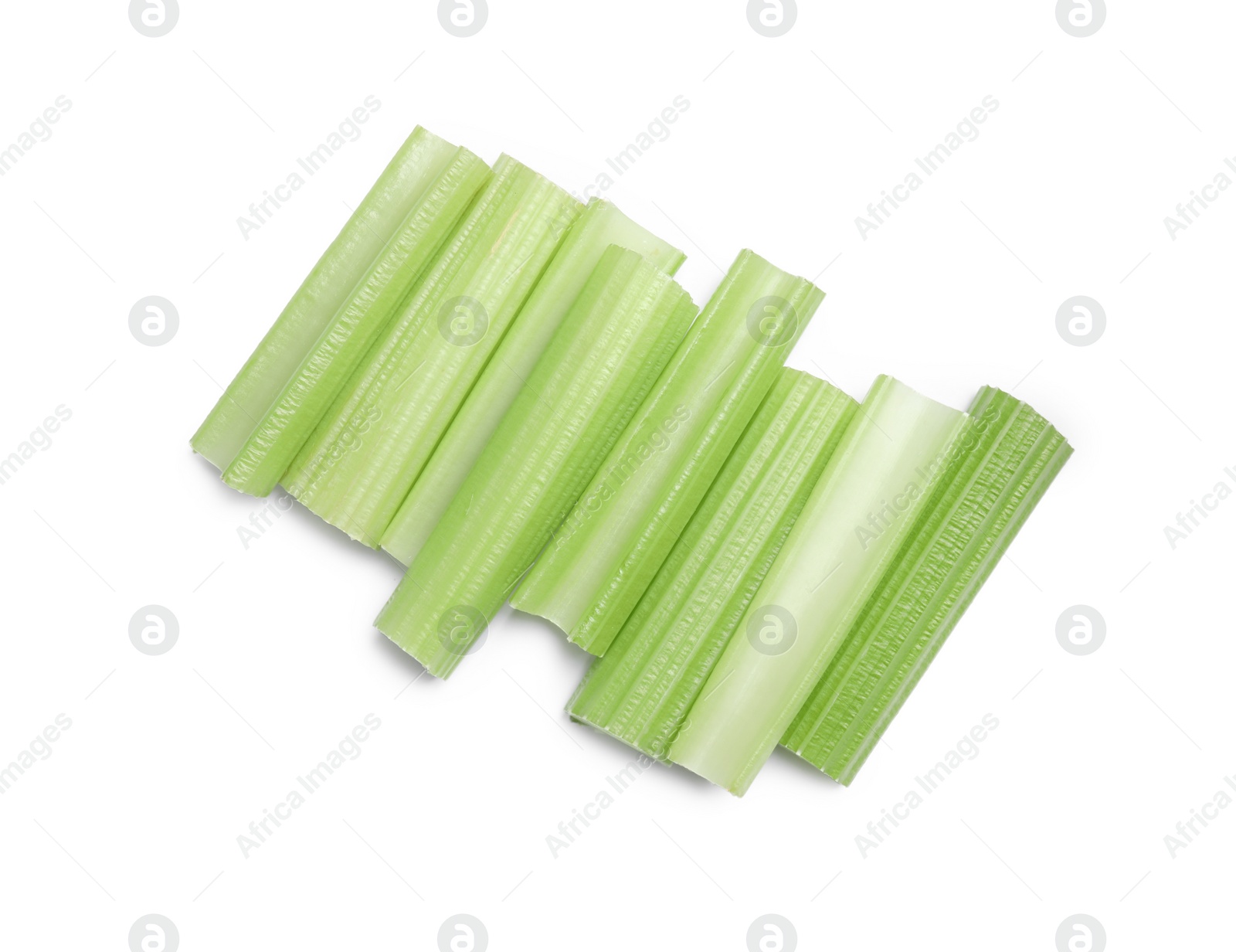 Photo of Fresh cut celery stalks isolated on white, top view