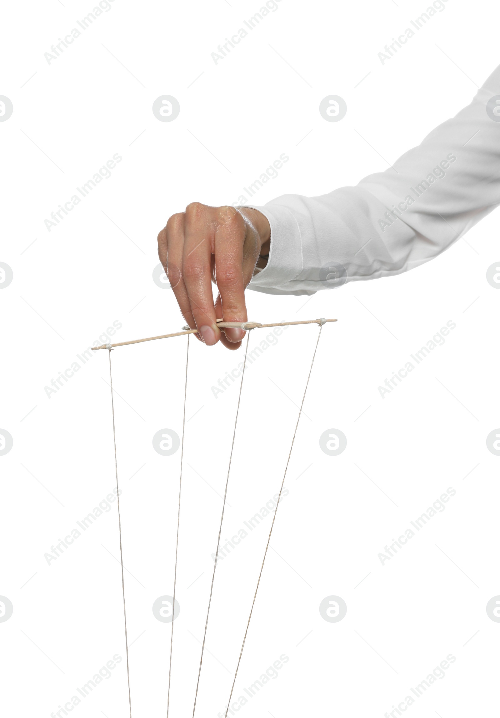 Photo of Woman pulling strings of puppet on white background, closeup