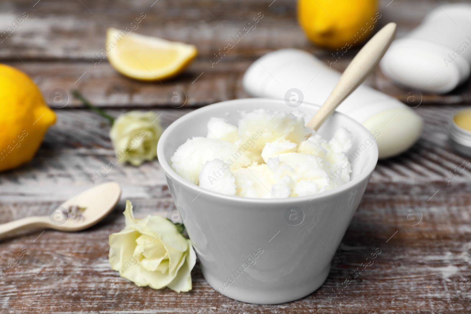 Photo of Ingredients for natural homemade deodorant on wooden table