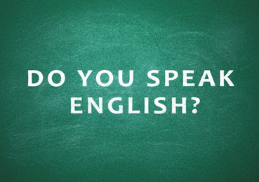 Green chalkboard with text Do You Speak English 