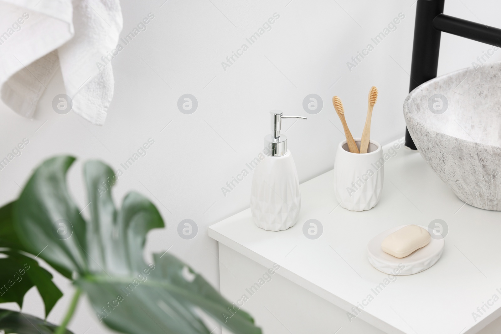 Photo of Different bath accessories and personal care products in bathroom