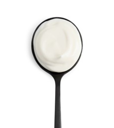 Photo of One black spoon with mayonnaise isolated on white, top view