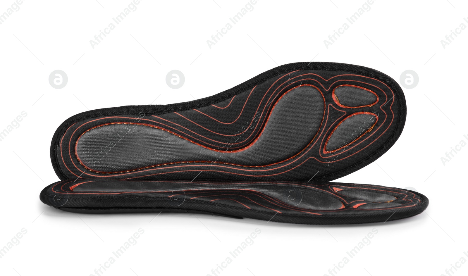 Photo of Orthopedic insoles for shoes on white background