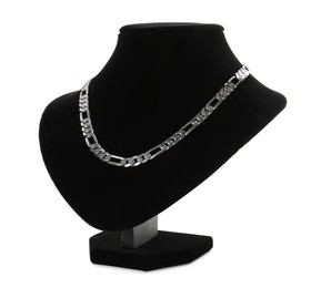 Photo of Stylish silver necklace on jewelry bust against white background