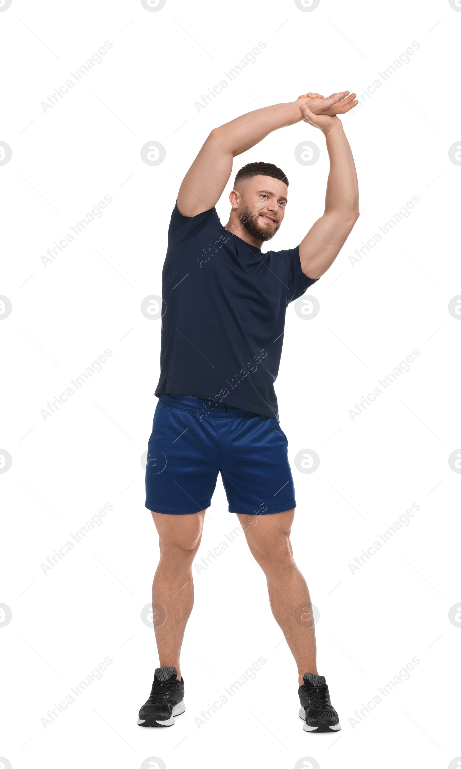 Photo of Man doing stretching on white background. Morning exercise