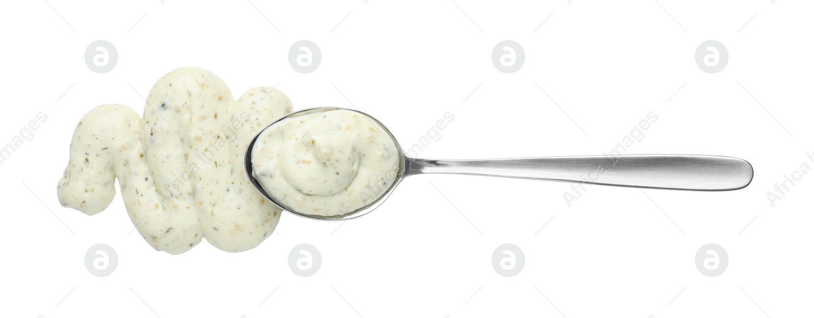 Photo of Tasty tartar sauce and spoon isolated on white, top view