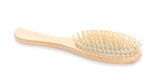 New wooden hair brush isolated on white