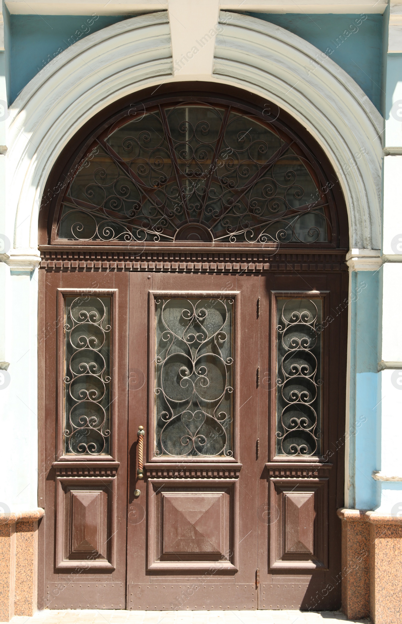 Photo of Building with vintage wooden door. Exterior design