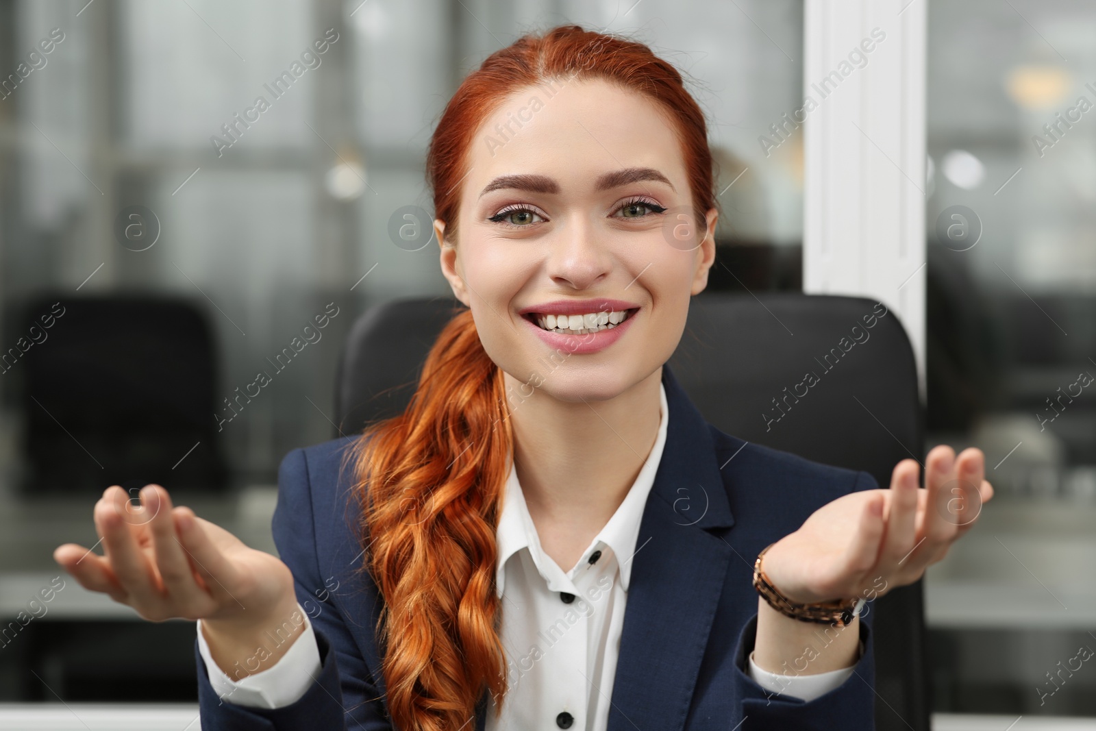 Photo of Happy woman having video call in office, view from web camera