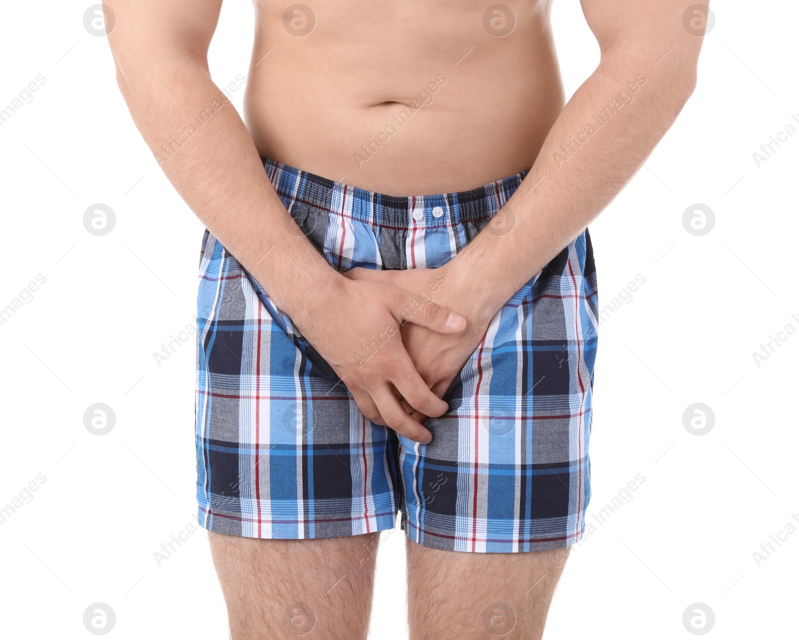 Photo of Young man with urological problems suffering from pain on white background