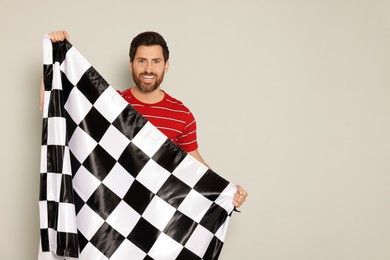 Photo of Man with checkered flag on white background, space for text