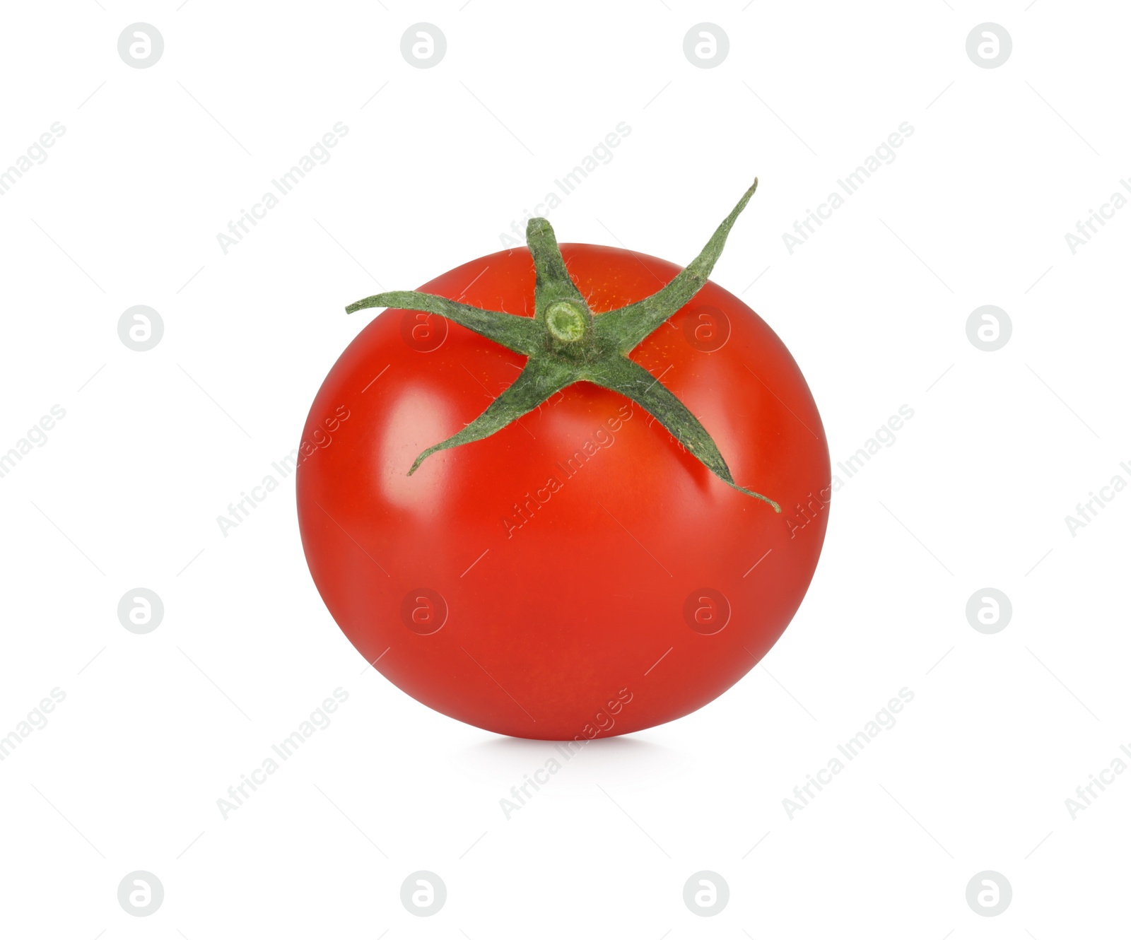 One red ripe cherry tomato isolated on white Photo of One red ripe cherry tomato isolated on white