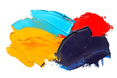 Photo of Colorful oil paint strokes on white background, top view